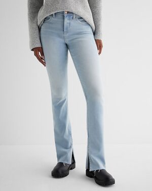 Mid Rise Light Wash Raw Hem Skyscraper Jeans